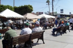 Soaking up winter sun sitting on the plaza